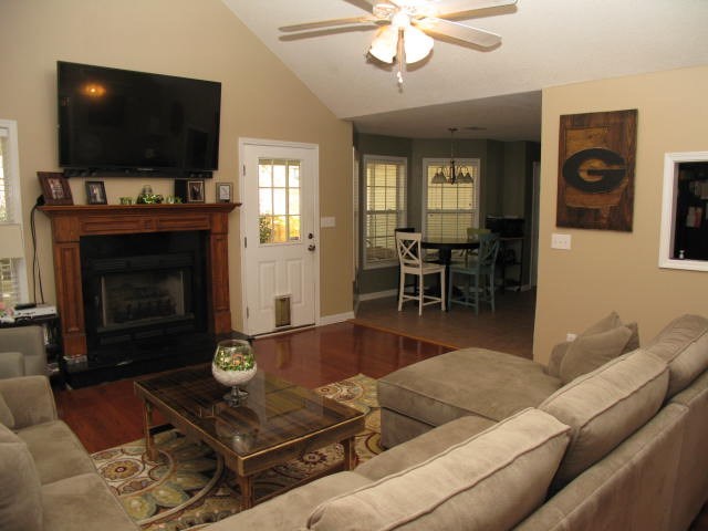 621 Homer Roberts Road Gray, GA 31032 - Photo 11 of 20 a living room with furniture and a flat screen tv