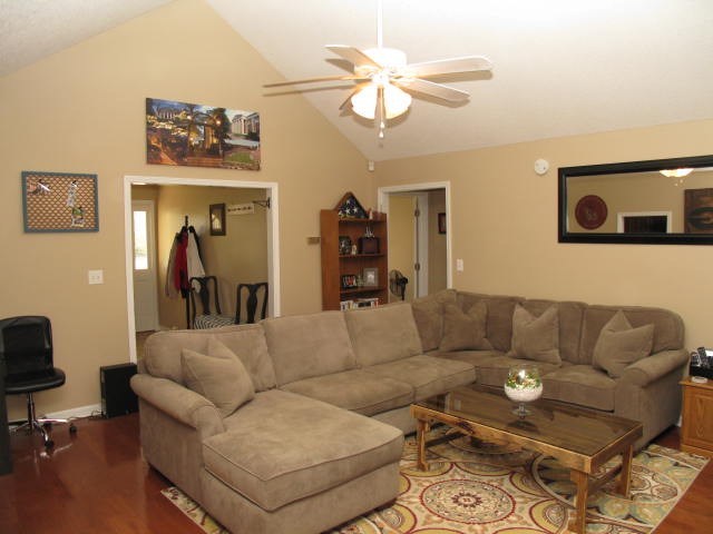 621 Homer Roberts Road Gray, GA 31032 - Photo 10 of 20 a living room with furniture and a flat screen tv