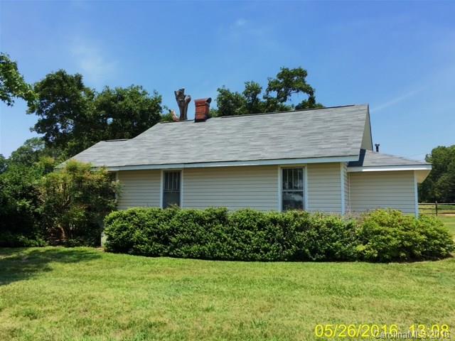 5001 Austin Road Monroe, NC 28112 - Photo 4 of 13 a view of a house with a yard