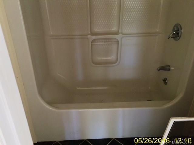 5001 Austin Road Monroe, NC 28112 - Photo 8 of 13 a bath tub sitting next to a white sink