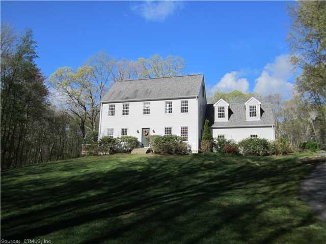 283 Durham Road Madison, CT 06443 - Photo 1 of 1 a front view of a house with a garden