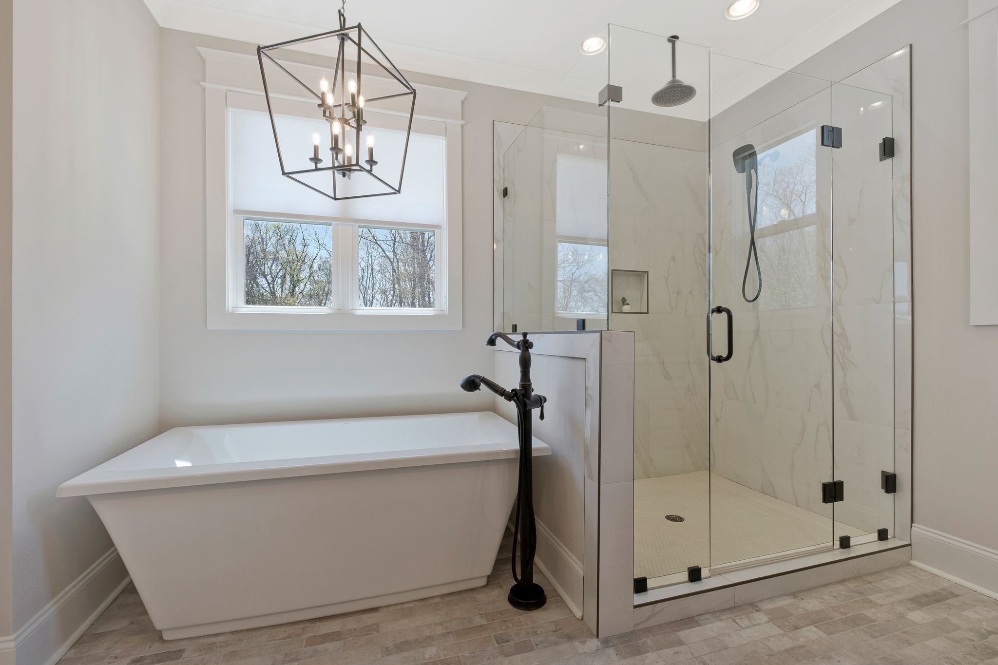 3050 Horn Springs Road Lebanon, TN 37087 - Photo 26 of 72 a bathroom with a bathtub a shower a sink and mirror