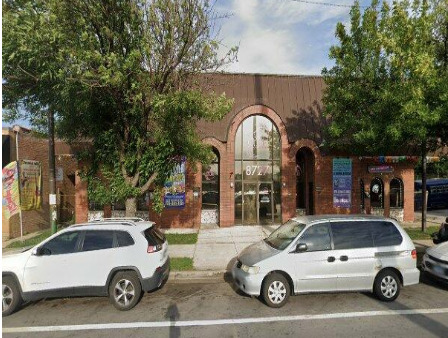 8727 South State Street, Unit 4 Chicago, IL 60619 - Photo 2 of 2 a car parked in front of a house
