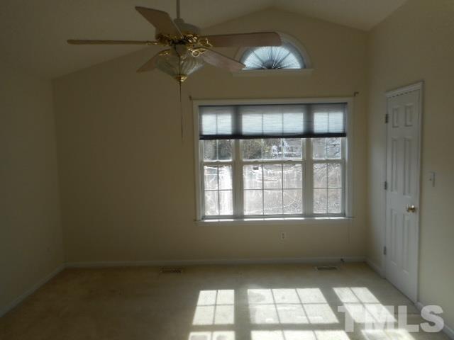 124 Forest Ridge Drive Willow Spring, NC 27592 - Photo 4 of 12 an empty room with a window