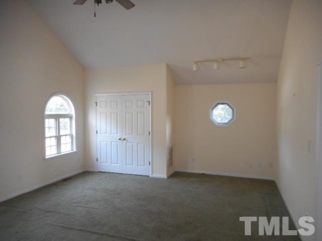 124 Forest Ridge Drive Willow Spring, NC 27592 - Photo 10 of 12 an empty room with windows