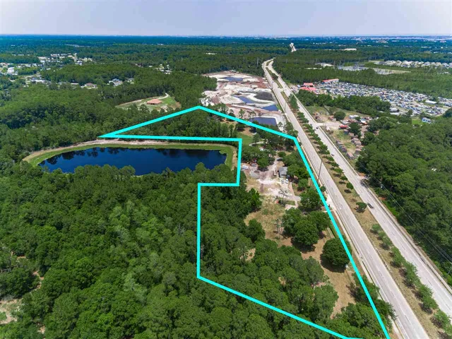 a view of a balcony with an outdoor space and seating