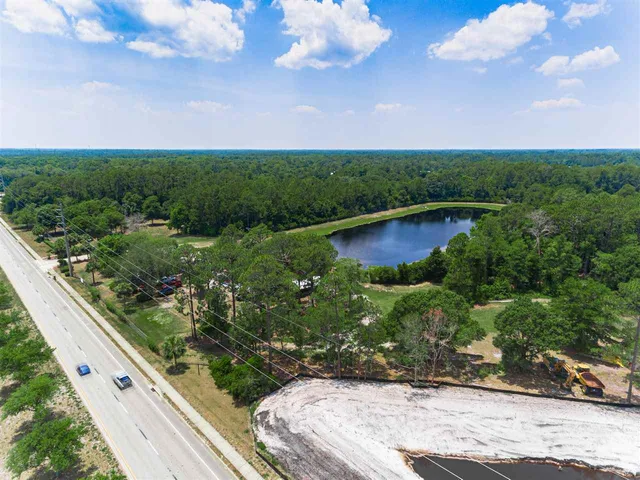 a view of a garden with a lake