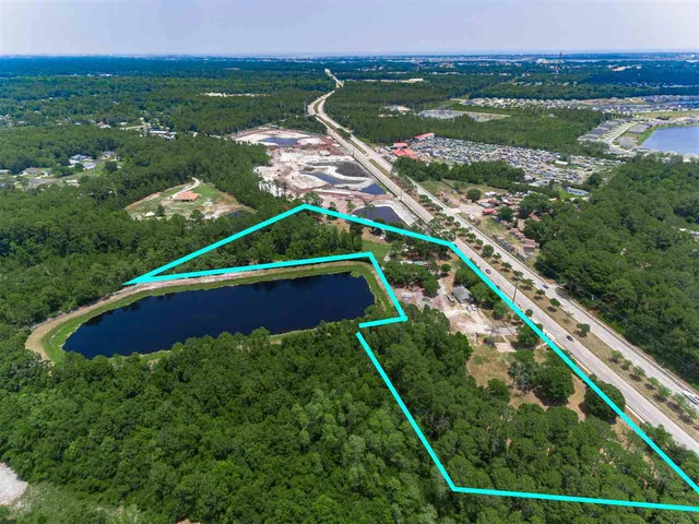 a view of a lake with a city