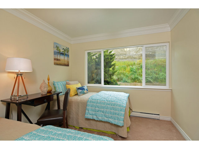220 Beach Drive Aptos, CA 95003 - Photo 17 of 24 a living room filled with furniture and a window