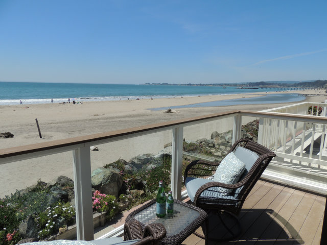 220 Beach Drive Aptos, CA 95003 - Photo 3 of 24 a view of a living room with furniture and floor to ceiling window