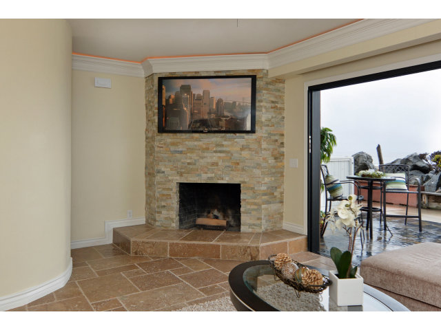220 Beach Drive Aptos, CA 95003 - Photo 6 of 24 a living room with furniture and a fireplace