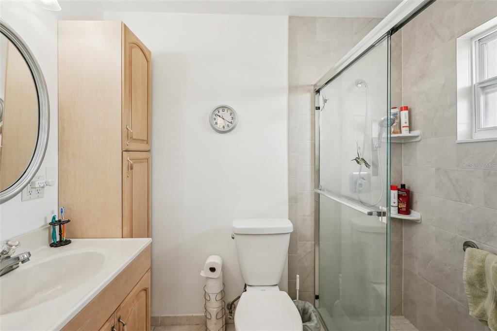 708 Rutgers Place Sun City Center, FL 33573 - Photo 16 of 27 a bathroom with a sink toilet and shower