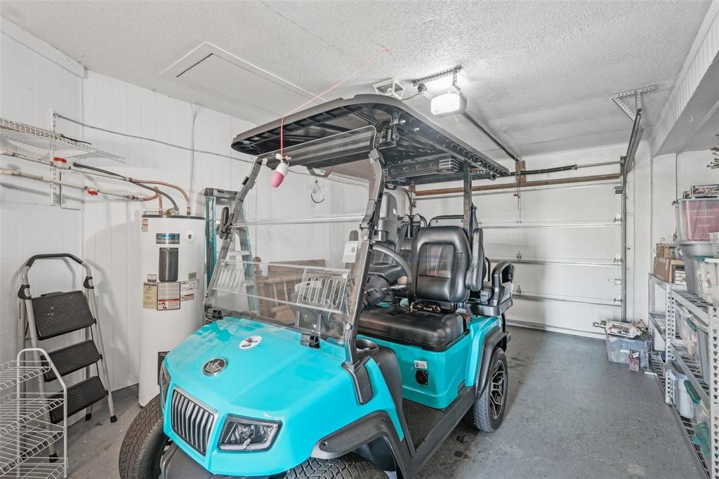 708 Rutgers Place Sun City Center, FL 33573 - Photo 23 of 27 a utility room with dryer washer and other items