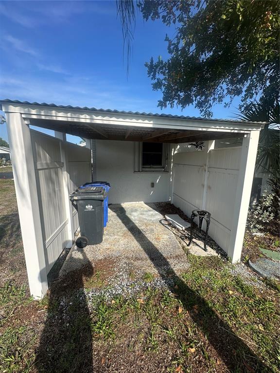 708 Rutgers Place Sun City Center, FL 33573 - Photo 24 of 27 a front view of a house with a yard