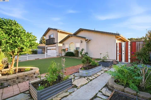a house view with a garden space