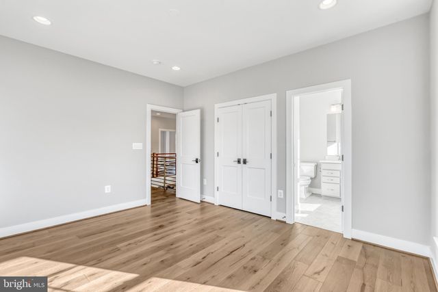 a bathroom with a double vanity sink mirror double and shower