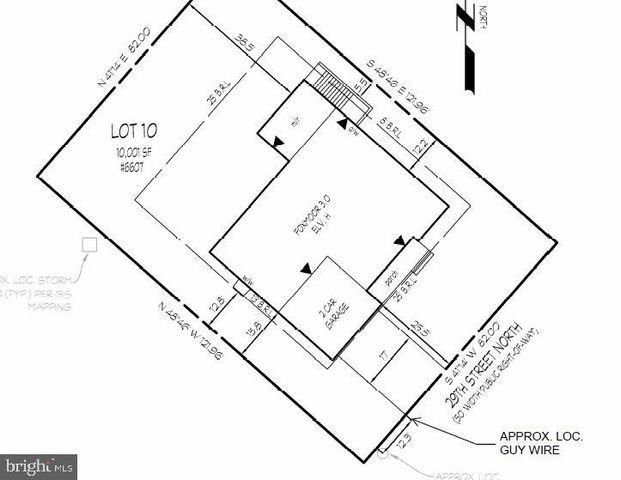 a living room with furniture and a lamp