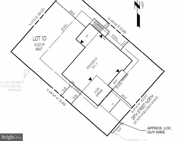 a living room with furniture and a lamp