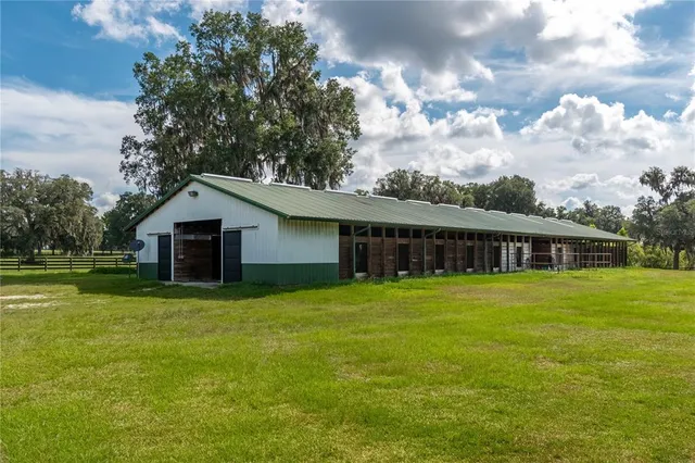 a view of a backyard of the house