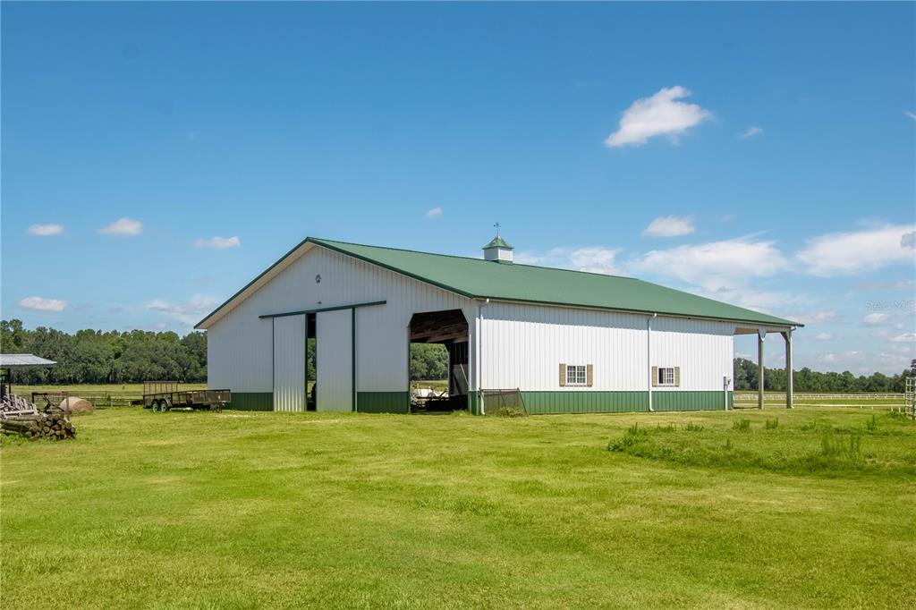 12520 Northwest 160th Street Reddick, FL 32686 - Photo 68 of 71 a front view of house with yard and garage