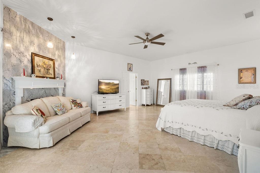 2958 Marquesas Court Windermere, FL 34786 - Photo 24 of 32 a living room with furniture and a bed