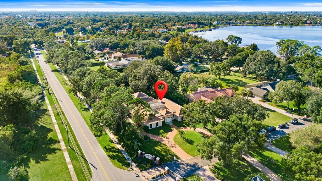 2958 Marquesas Court Windermere, FL 34786 - Photo 6 of 32 an aerial view of residential houses with outdoor space and river