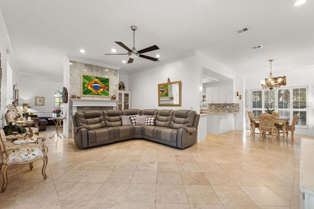 2958 Marquesas Court Windermere, FL 34786 - Photo 10 of 32 a living room with furniture and a flat screen tv