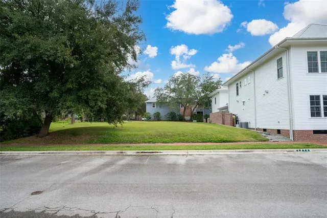 a view of street along with trees