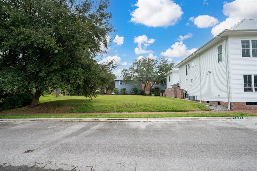a view of street along with trees