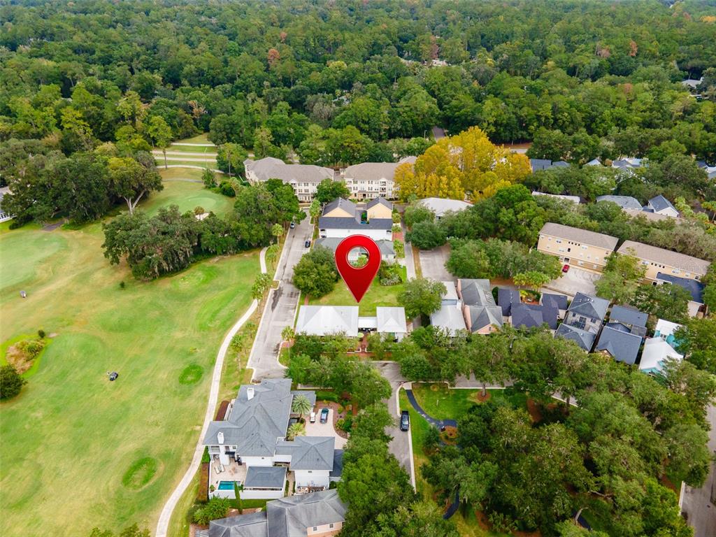 9139 Southwest 47 Place Gainesville, FL 32608 - Photo 11 of 41 an aerial view of a house with a yard and outdoor seating