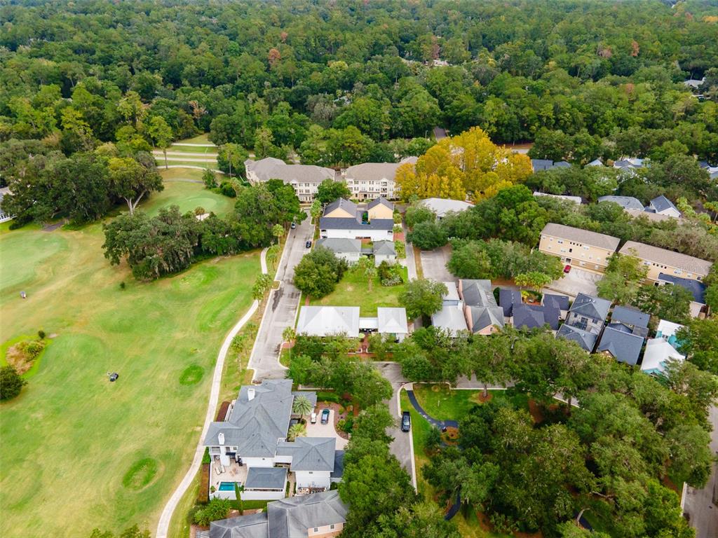 9139 Southwest 47 Place Gainesville, FL 32608 - Photo 12 of 41 an aerial view of residential houses with outdoor space and trees