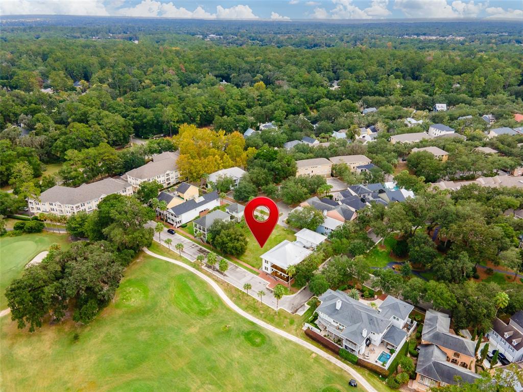 9139 Southwest 47 Place Gainesville, FL 32608 - Photo 13 of 41 an aerial view of residential houses with outdoor space and trees