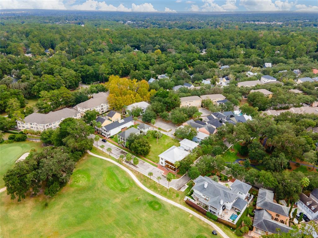 9139 Southwest 47 Place Gainesville, FL 32608 - Photo 14 of 41 an aerial view of residential houses with outdoor space and trees