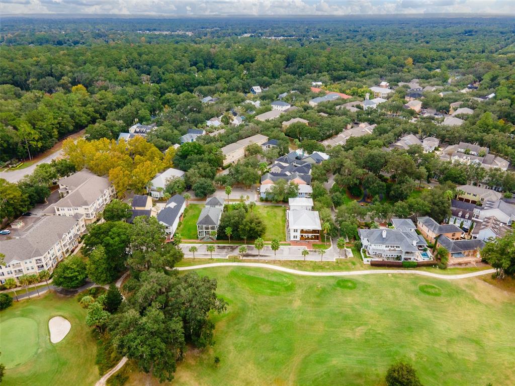 9139 Southwest 47 Place Gainesville, FL 32608 - Photo 16 of 41 an aerial view of residential houses with outdoor space and trees