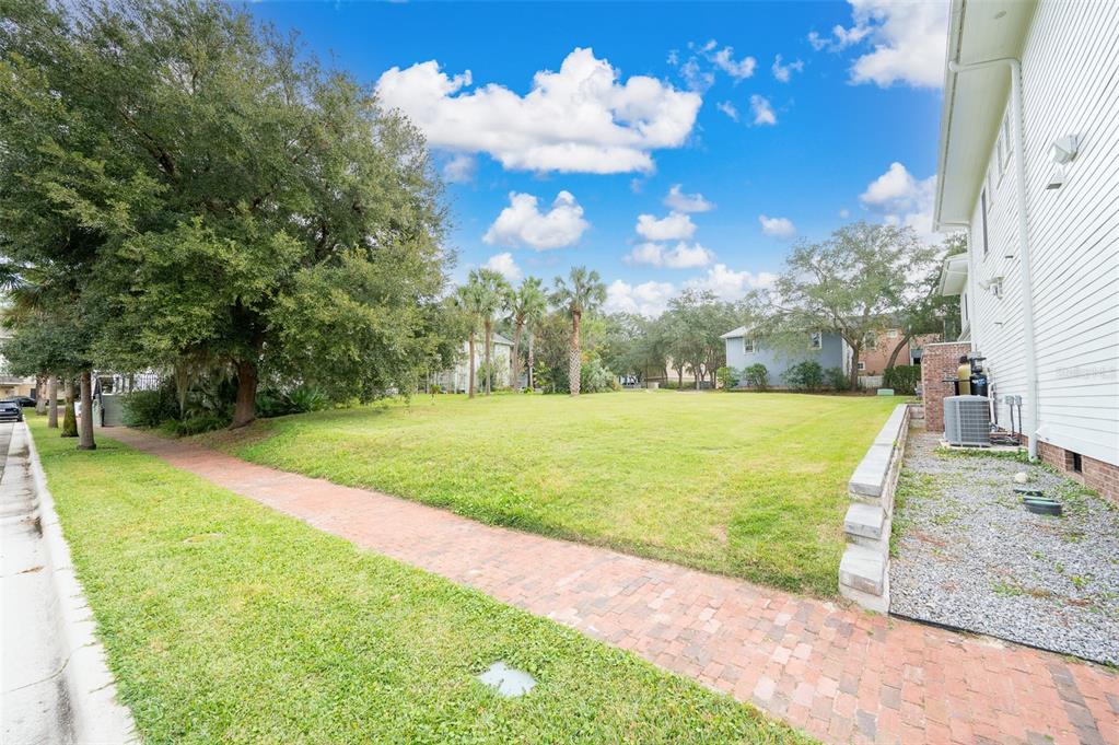9139 Southwest 47 Place Gainesville, FL 32608 - Photo 2 of 41 a view of a golf course with a big yard