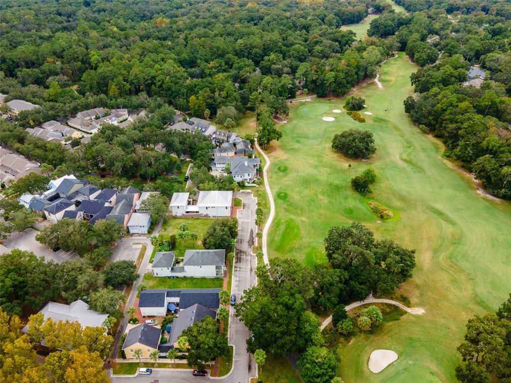 9139 Southwest 47 Place Gainesville, FL 32608 - Photo 22 of 41 an aerial view of residential houses with outdoor space and trees all around
