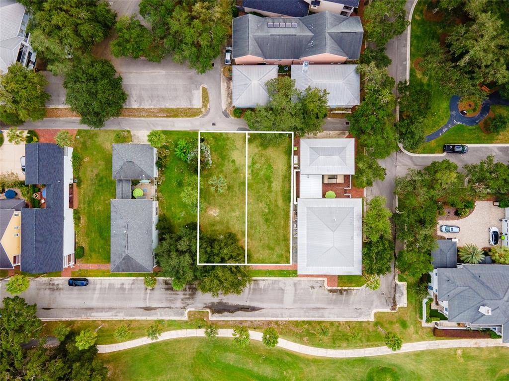 9139 Southwest 47 Place Gainesville, FL 32608 - Photo 25 of 41 an aerial view of a house with a swimming pool