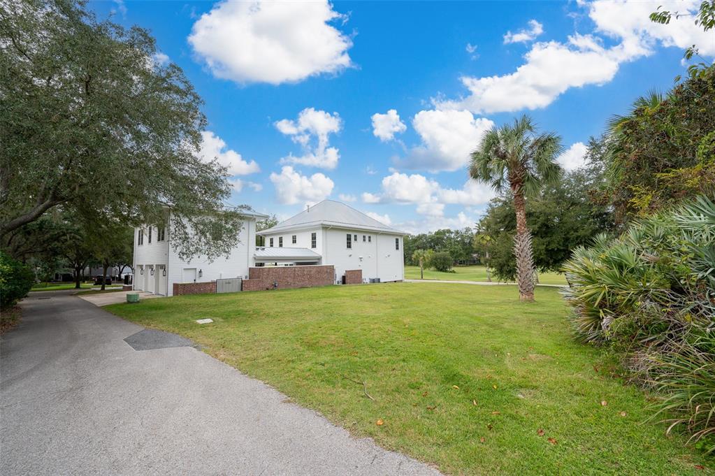 9139 Southwest 47 Place Gainesville, FL 32608 - Photo 28 of 41 a view of a house with a yard