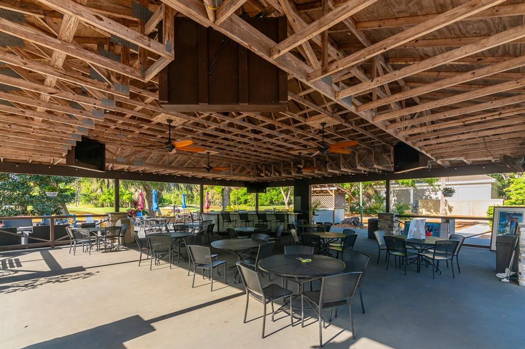 9139 Southwest 47 Place Gainesville, FL 32608 - Photo 39 of 41 a view of a bar restaurant