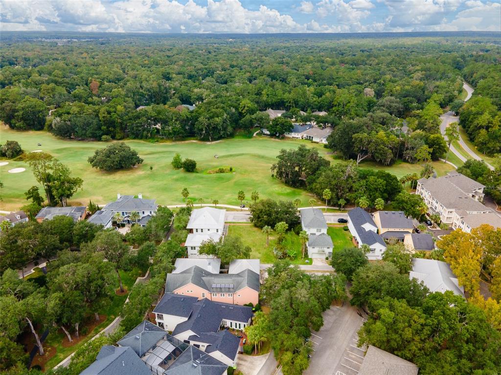 9139 Southwest 47 Place Gainesville, FL 32608 - Photo 8 of 41 an aerial view of residential houses with outdoor space and trees