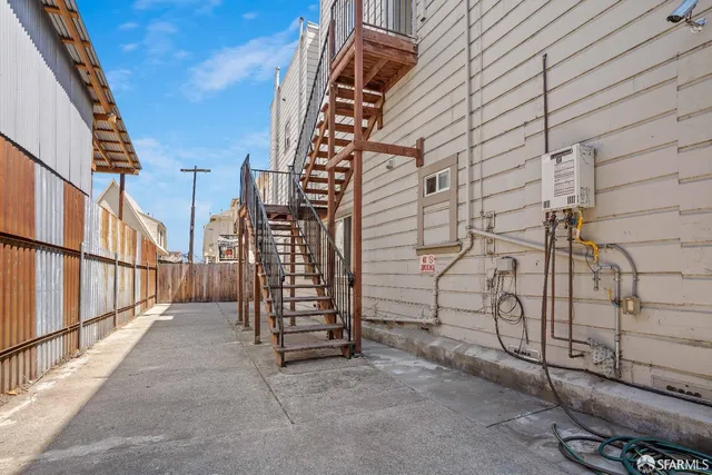 a view of wooden door with stairs