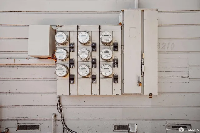 a bathroom with a cabinet and a shower