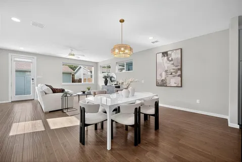 a kitchen with cabinets and steel stainless steel appliances