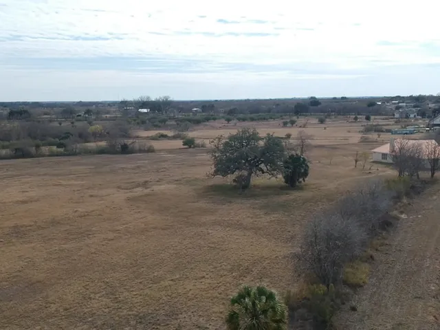 a view of a lake with beach