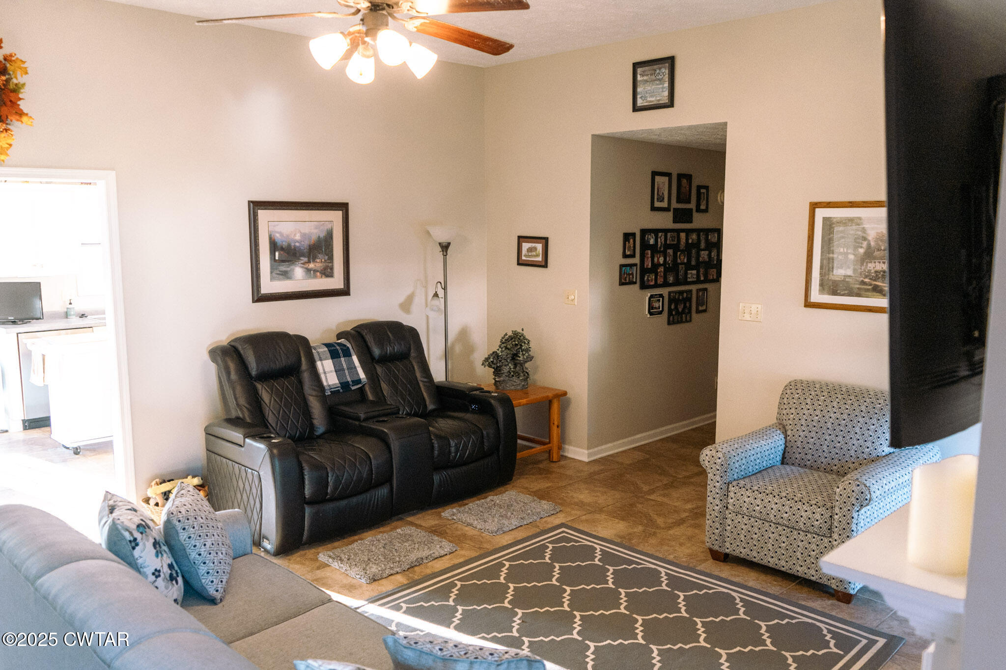 15 Battery Cove Jackson, TN 38305 - Photo 13 of 25 a living room with furniture a rug and a window