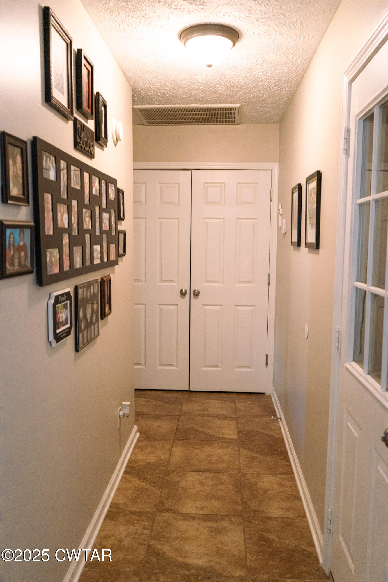 15 Battery Cove Jackson, TN 38305 - Photo 16 of 25 a view of a hallway with wooden floor