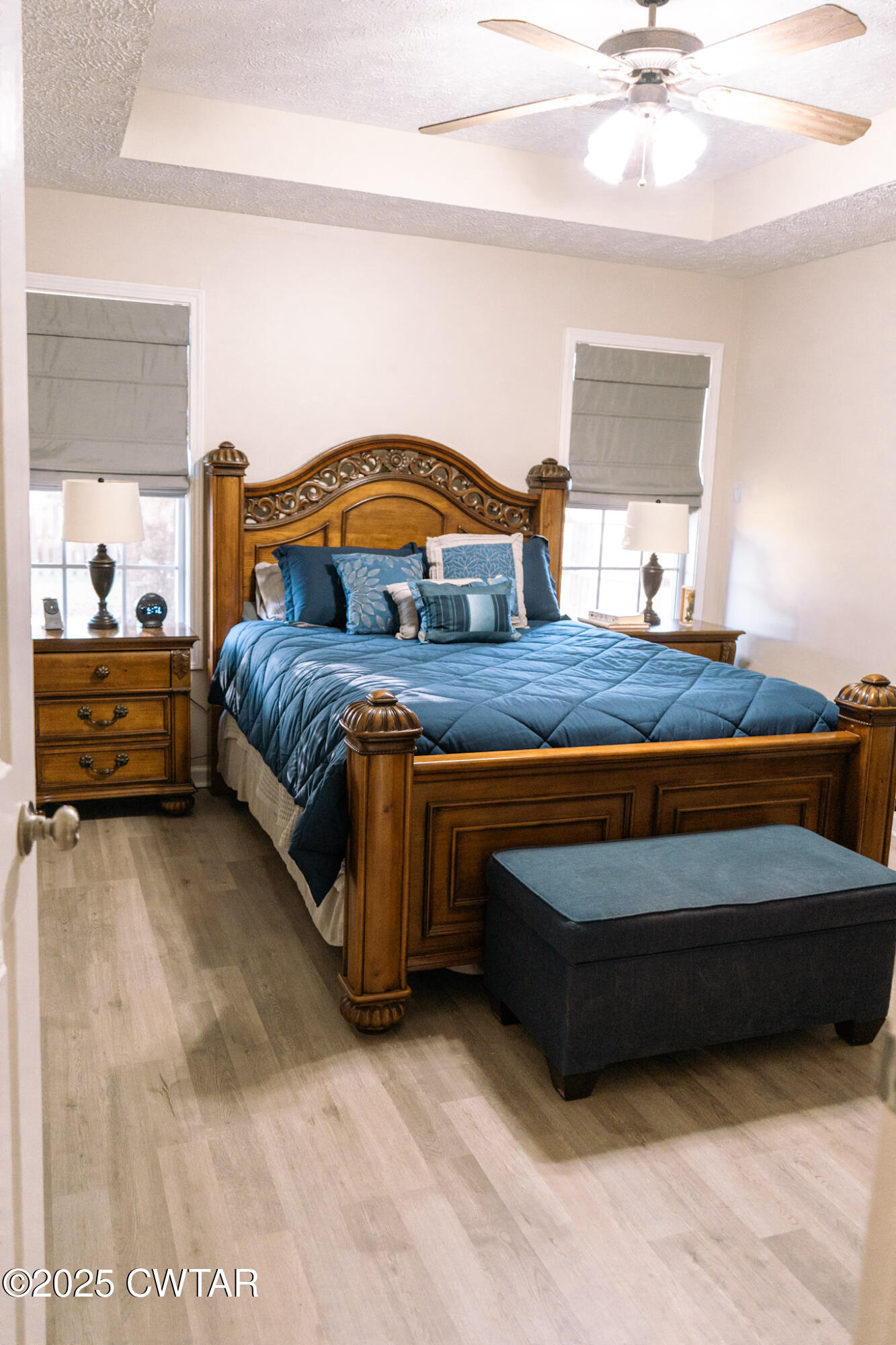 15 Battery Cove Jackson, TN 38305 - Photo 17 of 25 a bedroom with a bed and a large dresser