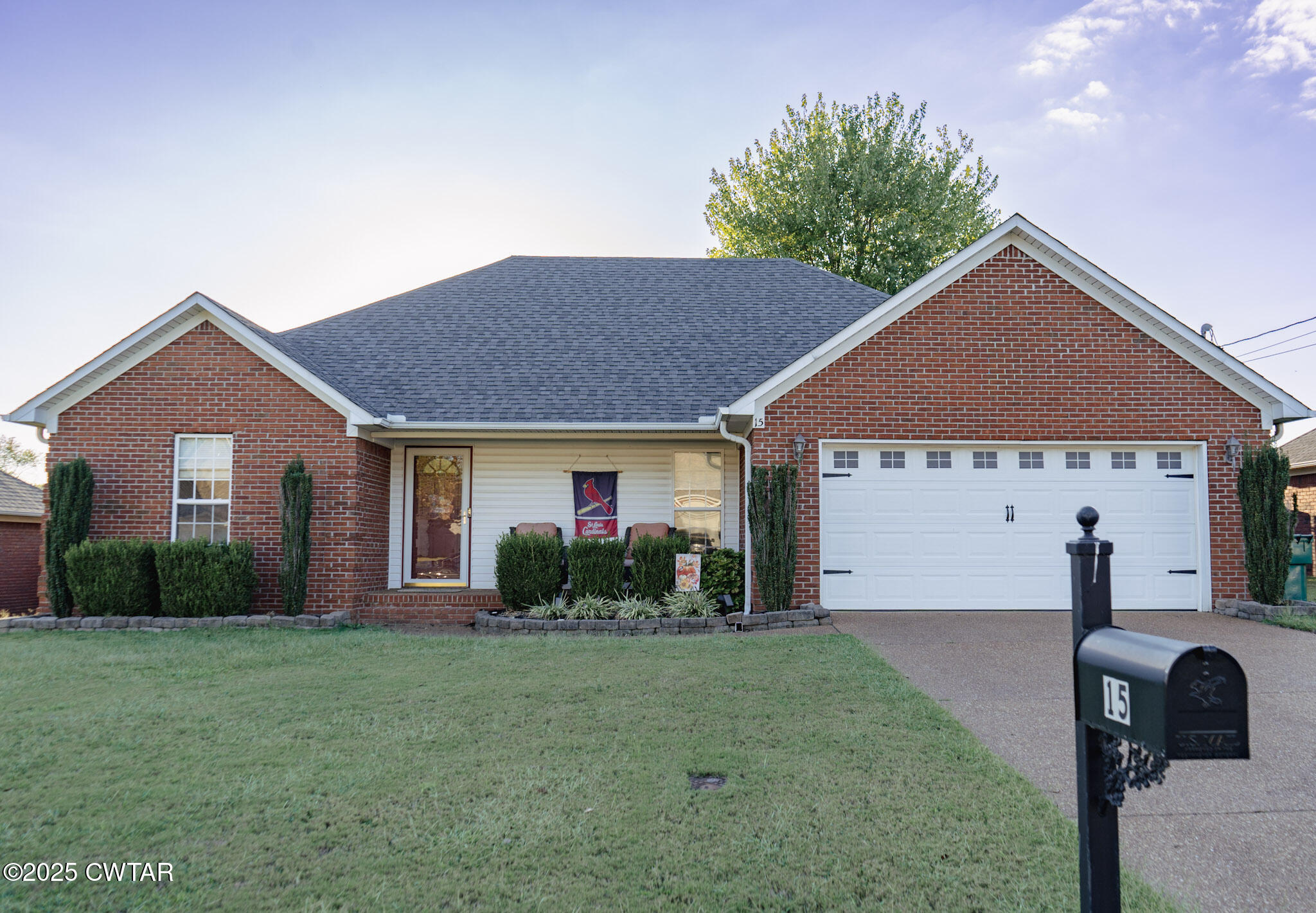 15 Battery Cove Jackson, TN 38305 - Photo 2 of 25 a view of a house with backyard and garden