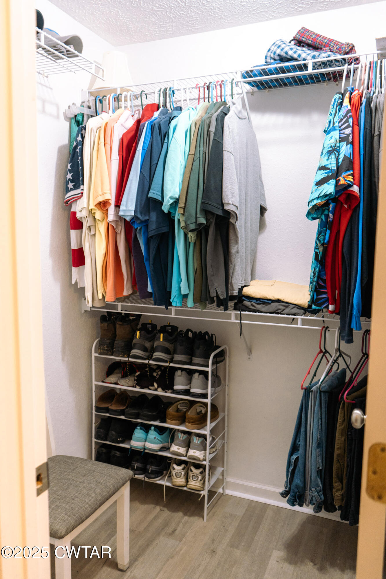 15 Battery Cove Jackson, TN 38305 - Photo 22 of 25 a view of walk in closet with clothes and shoes