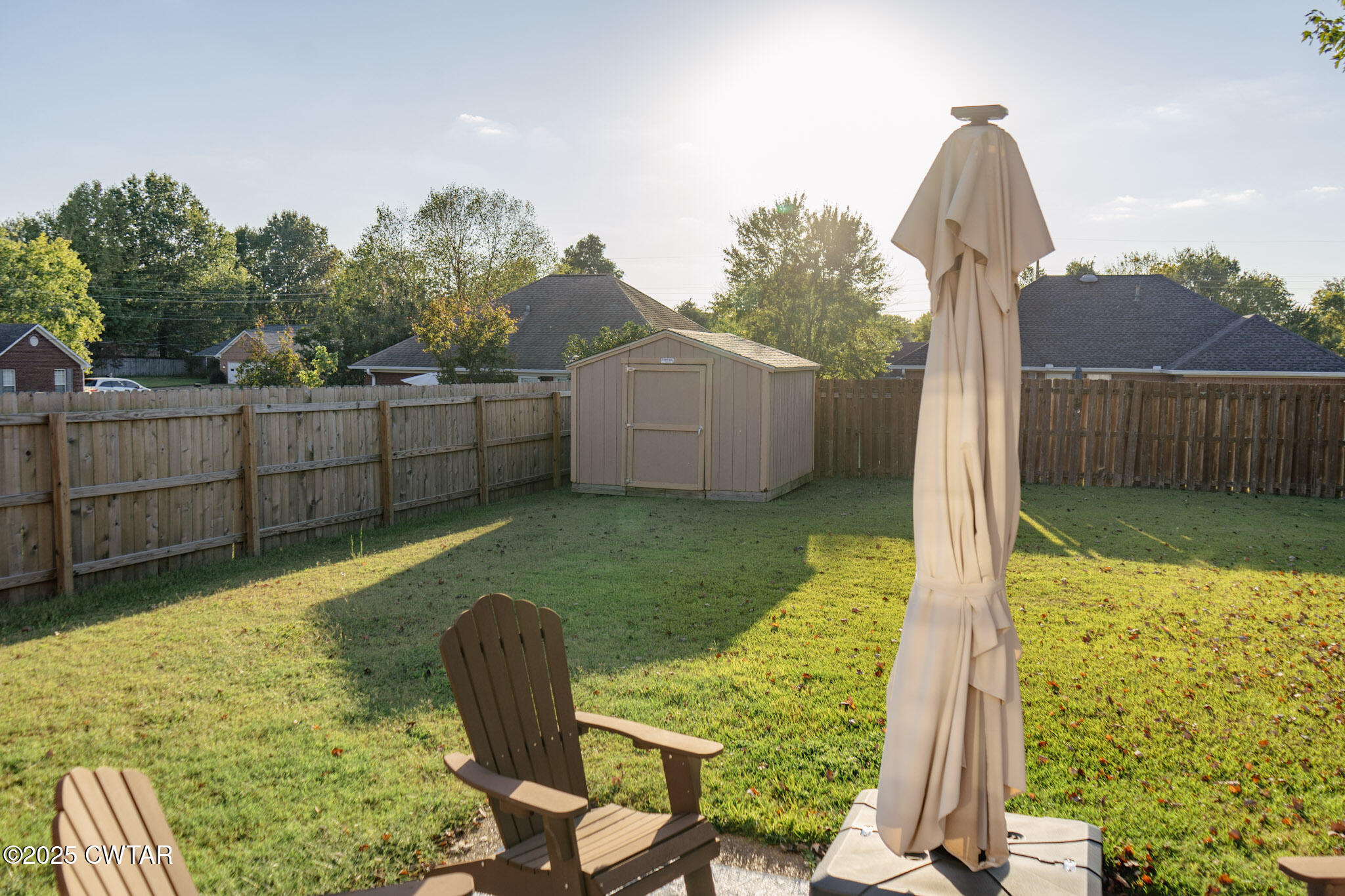 15 Battery Cove Jackson, TN 38305 - Photo 24 of 25 a view of a backyard with plants and a patio